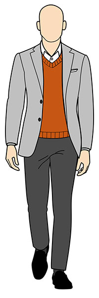 grey jeans outfit example with orange sweater and light grey blazer