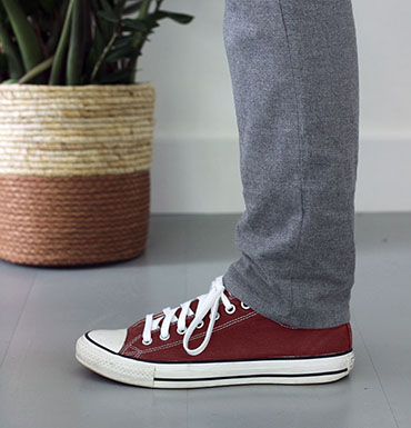Grey chino pants with red shoes