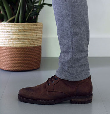 grey pants with brown shoes